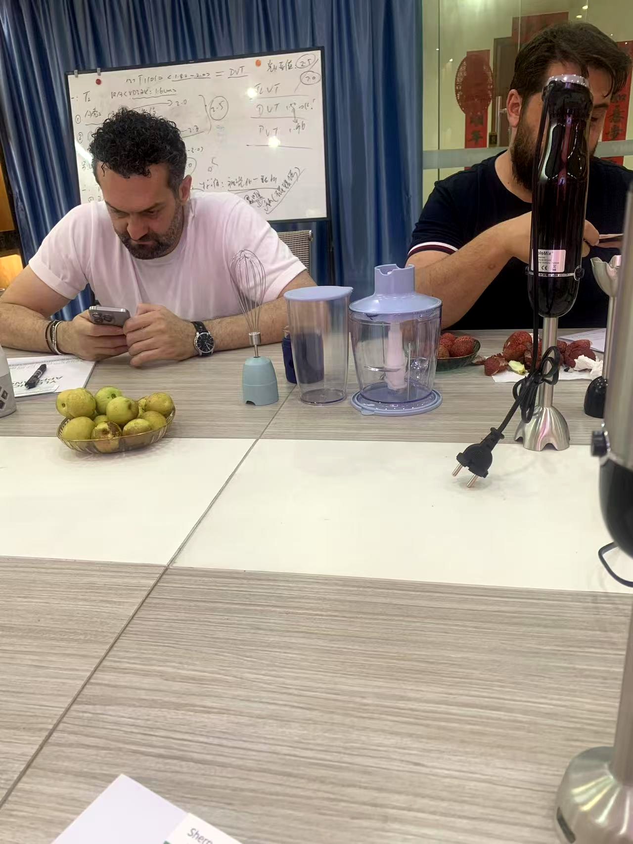 Buyer reviewing quotations with the YLD Home sales team